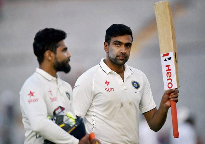  R Ashwin and Ravindra Jadeja walk off the field after the end of the 2nd day