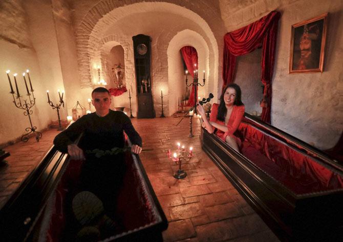 Tami Varma and her brother Robin at Castle Bucharest pose in coffins at Bran Castle, in Bran, Romania. AP/PTI Photo