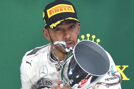 F1: Lewis Hamilton wins Brazilian GP, takes title fight to last race