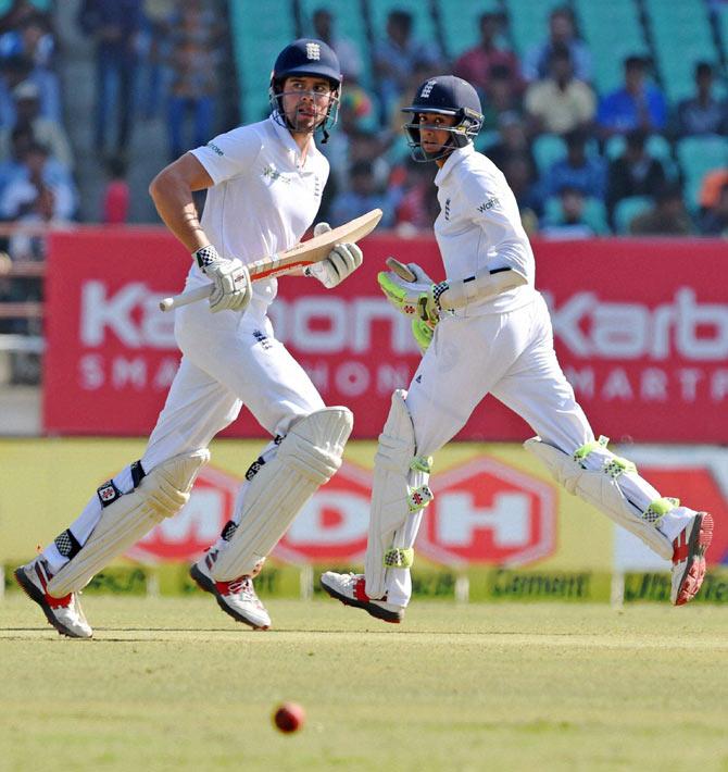 England batsman Haseeb Hameed and Alastair Cook running between the wickets on the fifth day of the first test match against India in Rajkot on Sunday