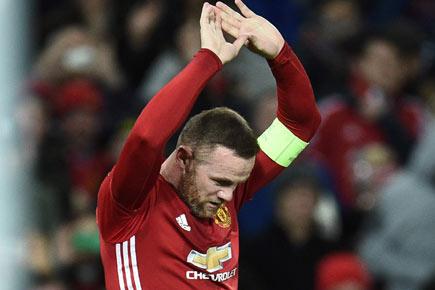 Europa League: Rooney sets record as Manchester United thump Feyenoord