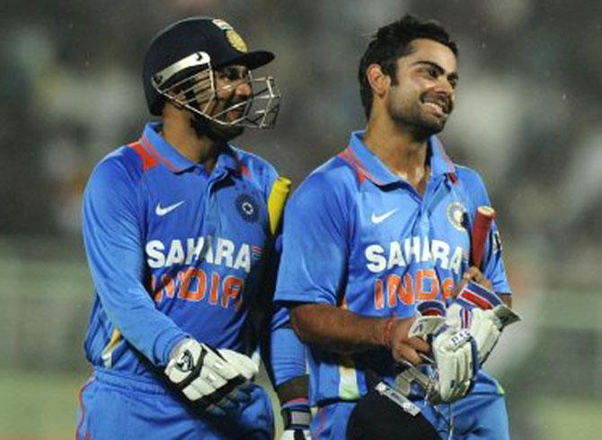 Virender Sehwag and Virat Kohli back in 2011. Pic/AFP
