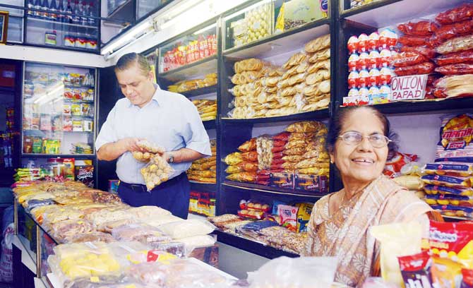 Nitin Sera with his mother at the Mangalore Store in Mahim
