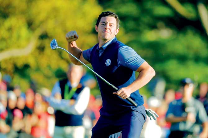 Europe’s Rory McIlroy reacts after making his putt at the Ryder Cup on Friday. Pic/AP