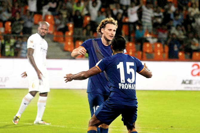 A jubilant Mumbai City striker Diego Forlan (left) after scoring a penalty  vs NorthEast yesterday. Pic/Sportzpics