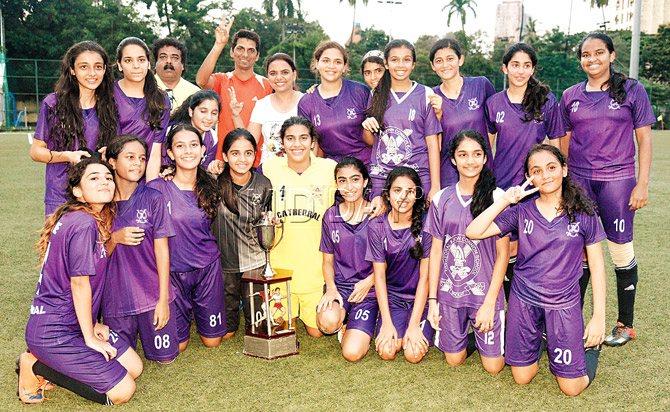 The Cathedral & John Connon (Fort) side pose with the trophy after winning the Mumbai Schools Sports Association (MSSA) girls U-16 final against Bombay Scottish (Mahim) at the Cooperage ground on Saturday. Pic/Suresh Karkera