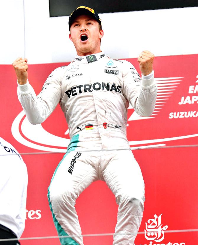 Mercedes driver Nico Rosberg exults on the podium after winning the Japanese Grand Prix in Suzuka yesterday. Pic/Getty Images