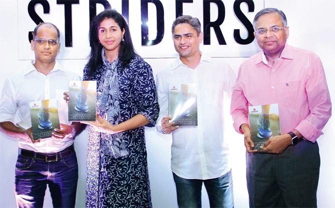 Anju Bobby George with (right) N Chandrasekaran (CEO,TCS) at the book release