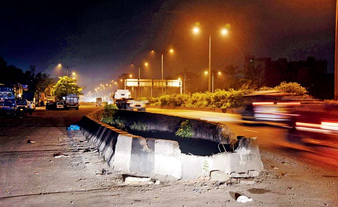 A portion of the median on the Eastern Express Highway, near Ramabai Nagar, broke under the impact of the crash. Pic/Sameer Markande