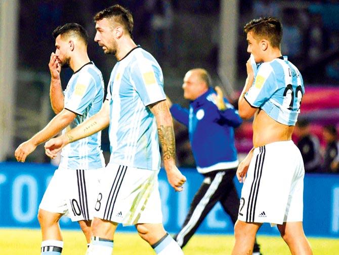 Argentina players pose a dejected look after their 0-1 defeat to Paraguay in the World Cup qualifiers on Tuesday. Pic/AFP
