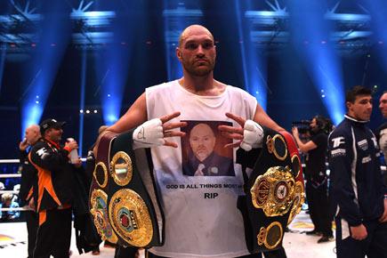 Boxer Tyson Fury vacates WBO and WBA world heavyweight titles