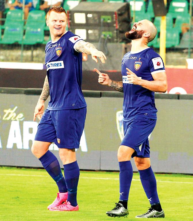 Chennaiyin FC Hans Mulder (right) celebrates a goal with teammate during ISL-3 tie against FC Goa yesterday. Pic/Sportzpics