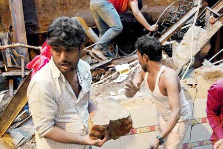 Behrampada collapse: 70 local youths spend 14 hrs clearing debris