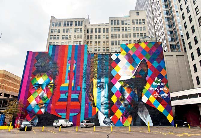Days after Bob Dylan was awarded the Nobel Prize in Literature, the songwriter’s home state Minnesota pays homage to him on Saturday with a mural designed by Brazilian artist Eduardo Kobra. Pic/AFP