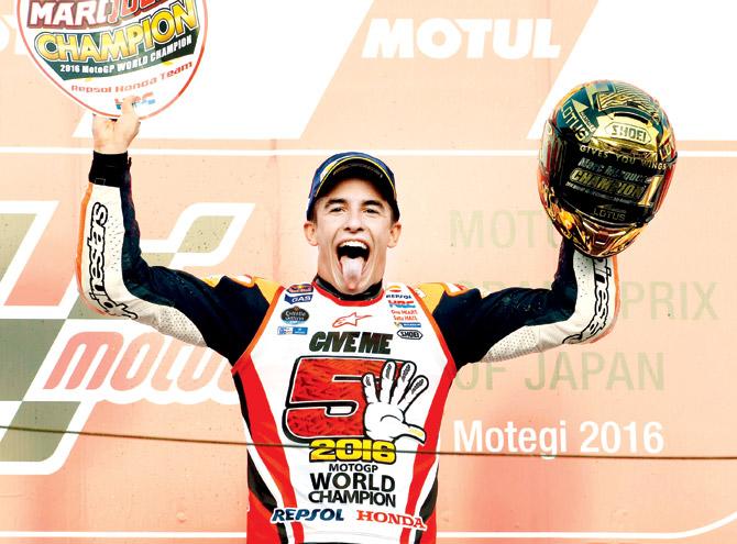 Japanese GP winner Marc Marquez of Spain celebrates his fifth world championship title in Motegi yesterday. Pic/AFP
