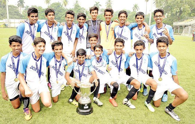 Don Bosco players pose with the trophy after winning the MSSA Ahmed Sailor U-16 title at Cooperage yesterday. Pics/Shadab Khan