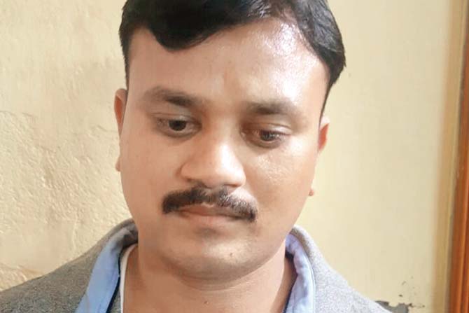 Sub-inspector Tushar Bhadane, one of the two cops arrested