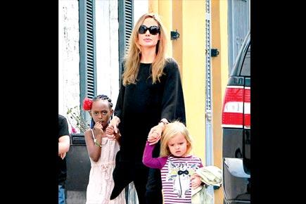 Angelina Jolie goes house hunting in Malibu with kids