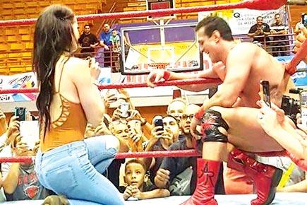 WWE Diva Paige goes down on one knee for wrestler-beau Alberto Del Rio