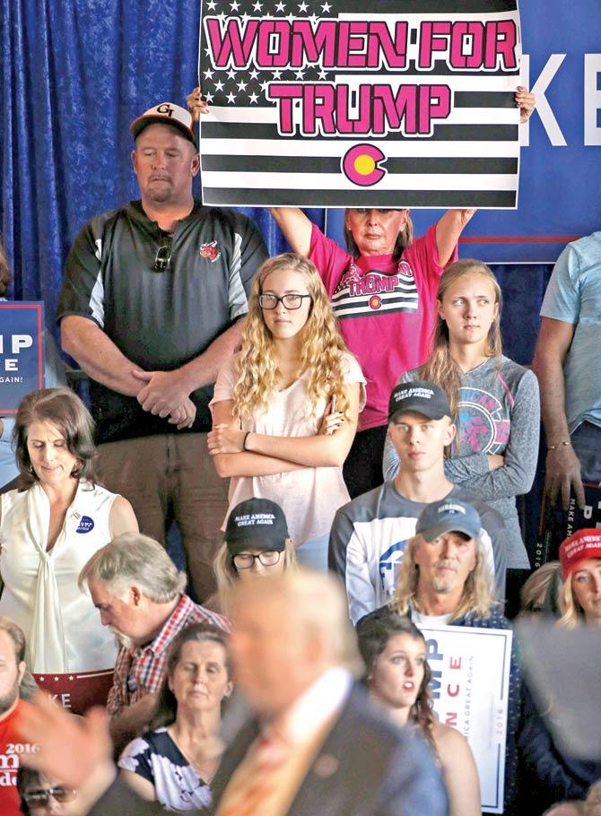 Supporters of Republican presidential candidate Donald Trump attend a rally at the Grand Junction Regional Airport in Grand Junction Colorado. Pic/Getty Images