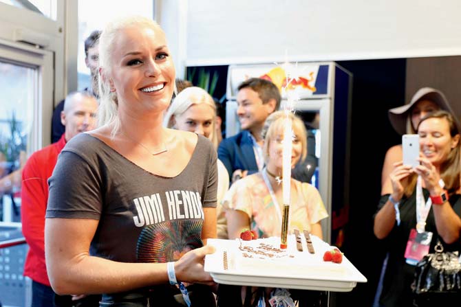 Vonn’s racy birthday American skier Lindsey Vonn, who turned 32 on October 18, holds the birthday cake presented to her by Red Bull driver Daniel Ricciardo after the qualifying race of the US Formula One Grand Prix in Austin on Saturday