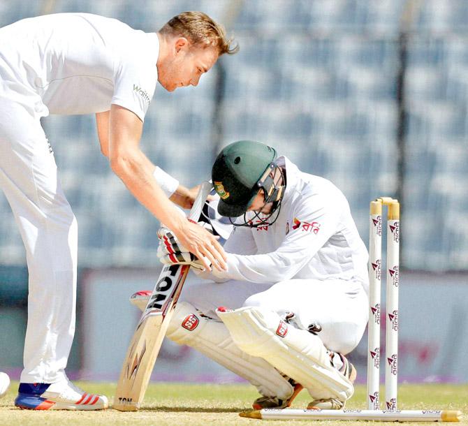 Stuart Broad (left) consoles Bangladesh batsman Sabbir Rahman yesterday. Pic/AP, PTI
