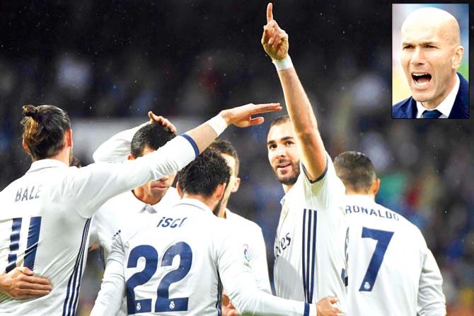 Real Madrid players celebrate a goal during the La Liga match vs Athletic Bilbao at the Bernabeu in Madrid on Sunday. Pic/AFP. Inset: Zinedine Zidane