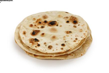 Man kills pregnant wife for not making round chapatis