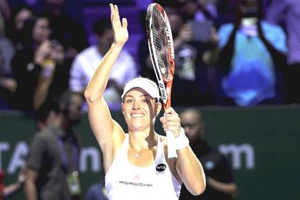 Angelique Kerber beats Simona Halep at WTA Finals