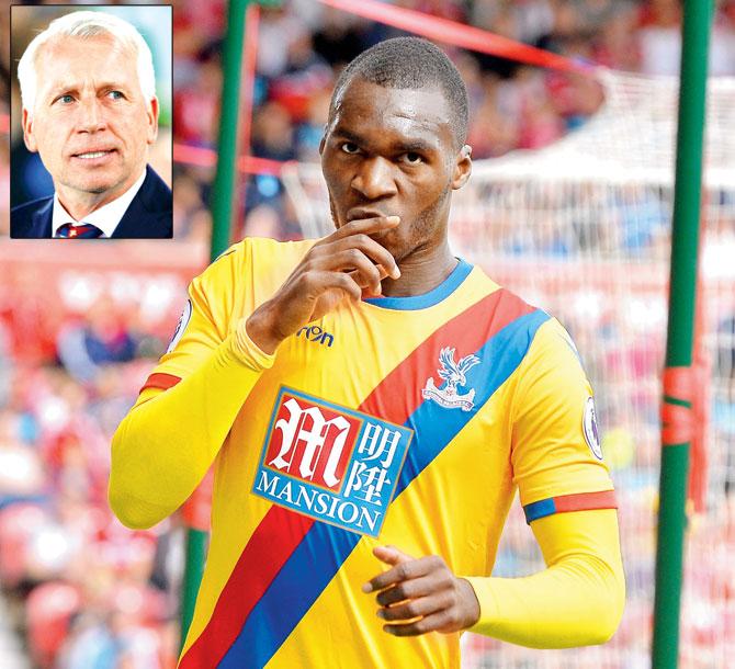Christian Benteke scored ten goals in his one season at Liverpool before he moved to Crystal Palace this summer. Pic/Getty Images. Inset: Alan Pardew