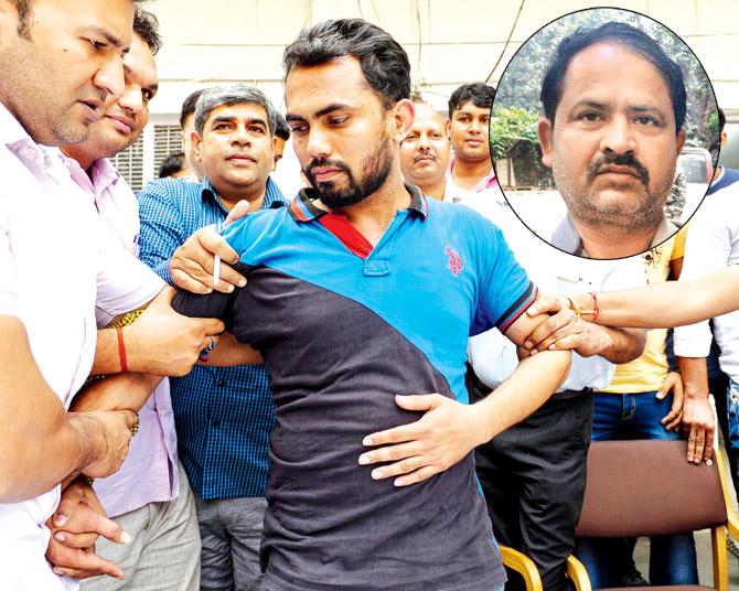 Delhi cops with Shoaib (centre), the fourth accused in the espionage case. Pic/AFP. Inset: Farhat Khan. Pic/twitter