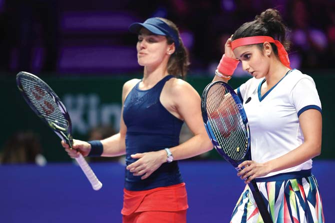 The Indo-Swiss pair of Sania Mirza (left) and Martina Hingis were playing in their first event since their split in July. pic/Getty Images