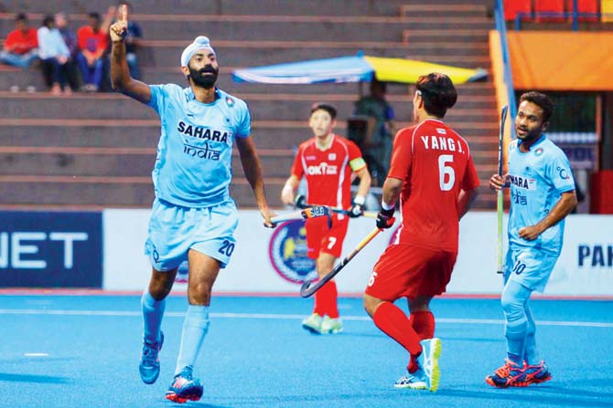 India’s Talwinder Singh (left) celebrates a goal against Korea in the Asian Champions Trophy semis in Kuantan, Malaysia on Saturday    