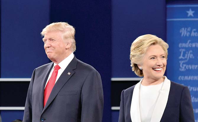 Republican presidential candidate Donald Trump and his Democrat counterpart Hillary Clinton. The election takes place on November 8. Pic/AFP