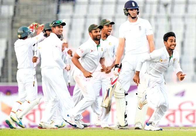 Man of the match Mehedi Hasan (right) celebrates with teammates after winning the second Test against England in Dhaka yesterday. Pic/AFP