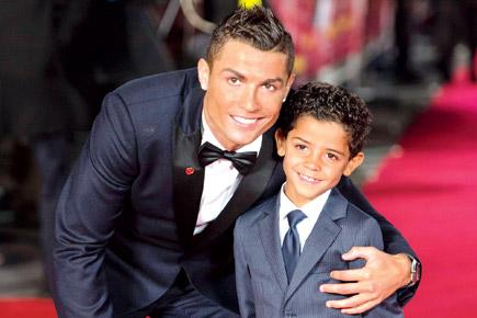 Cristiano Ronaldo turns ball-boy for his son's football match