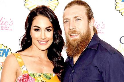 WWE stars Brie Bella and Daniel Bryan expecting their first child