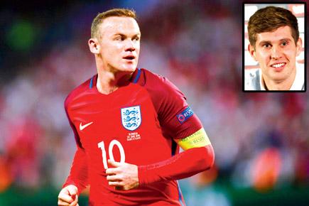 Wayne Rooney is the key to England's success, says defender Stones