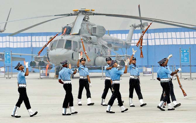 IAF personnel perform with their guns during the full-dress rehearsal for the Air Force Day function at Air Force Station Hindon in Ghaziabad. Pic/PTI