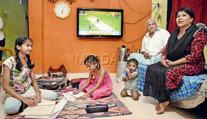 Anjali Gupta (14) and Nikita Gupta (9) with their mother Savitri Gupta at their residence in Pant Nagar, Ghatkopar. Pic/Shadab Khan