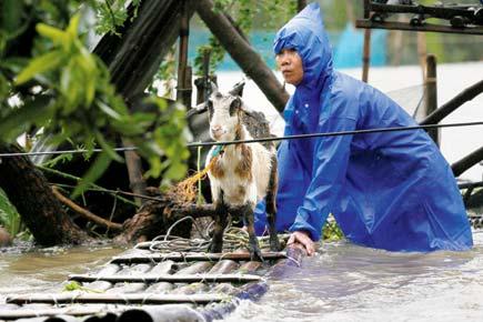 Typhoon Haima pounds China killing 13 people