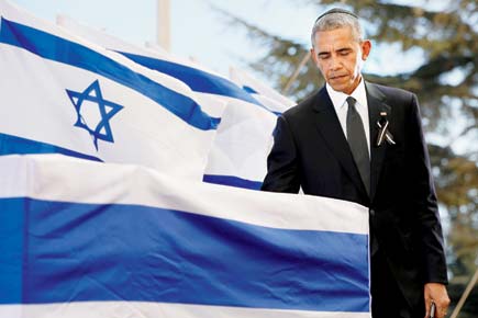 Obama compares Peres to Mandela and Queen