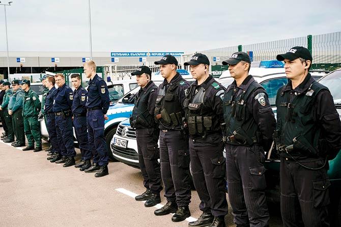 German policemen, Bulgarian Border guards and members of the new European Border and Coast Guard task force attend an inauguration ceremony at the Kapitan Andreevo checkpoint, at the Bulgaria-Turkey border. Pic/AFP