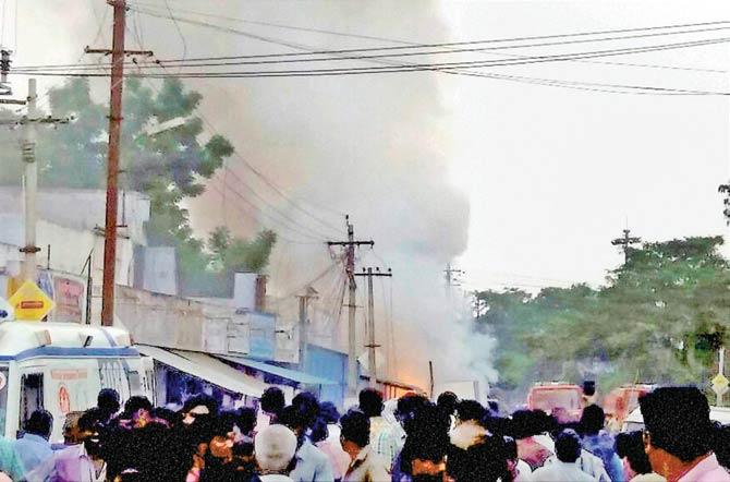 A godown caught fire in the incident. Pic/PTI