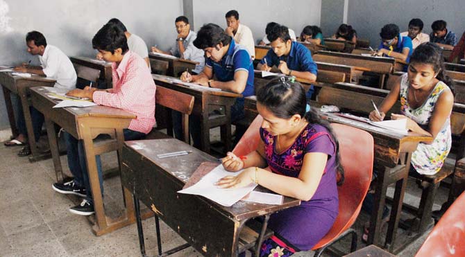 Students appearing for a HSC exam. File pic