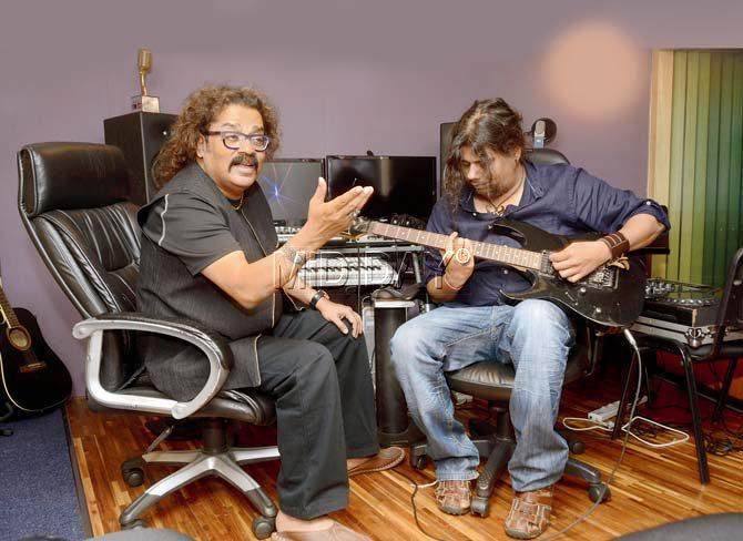 Hariharan (left) rehearses with son, Akshay, at their home studio in Powai ahead of the Bollywood Music Project gig today. Pic/Bipin Kokate