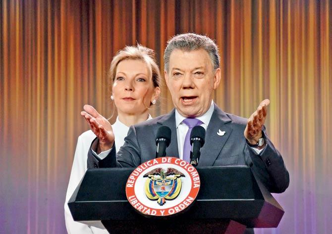 Colombian president Juan Manuel Santos delivers a speech next to his wife Maria Clemencia Rodriguez after winning the Nobel Peace Prize 2016 on Friday at Casa de Narino. Pic/AFP