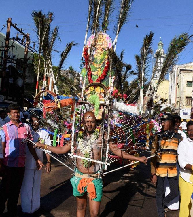 AIADMK cadres take out a kavadi procession in Madurai to pray for Jayalalithaa’s recovery. Pic/PTI
