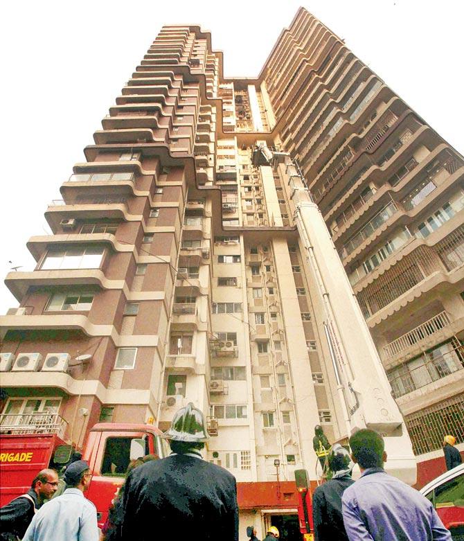 The last time an audit was done, the fire brigade had suggested the society to install a fire door in the buildings, which was complied with, and having one more hose in the six-building complex for more effective fire-fighting. Pics/PTI, Bipin Kokate