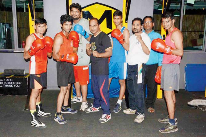 Manoj Pingale with his proteges at the Multifit center. Pic/Vaishali Galim